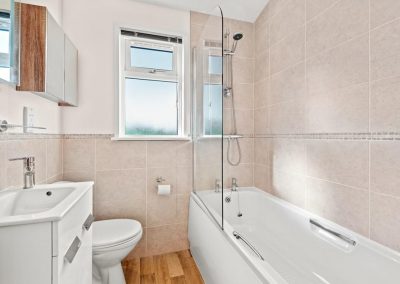 Family bathroom with bath, shower and toilet
